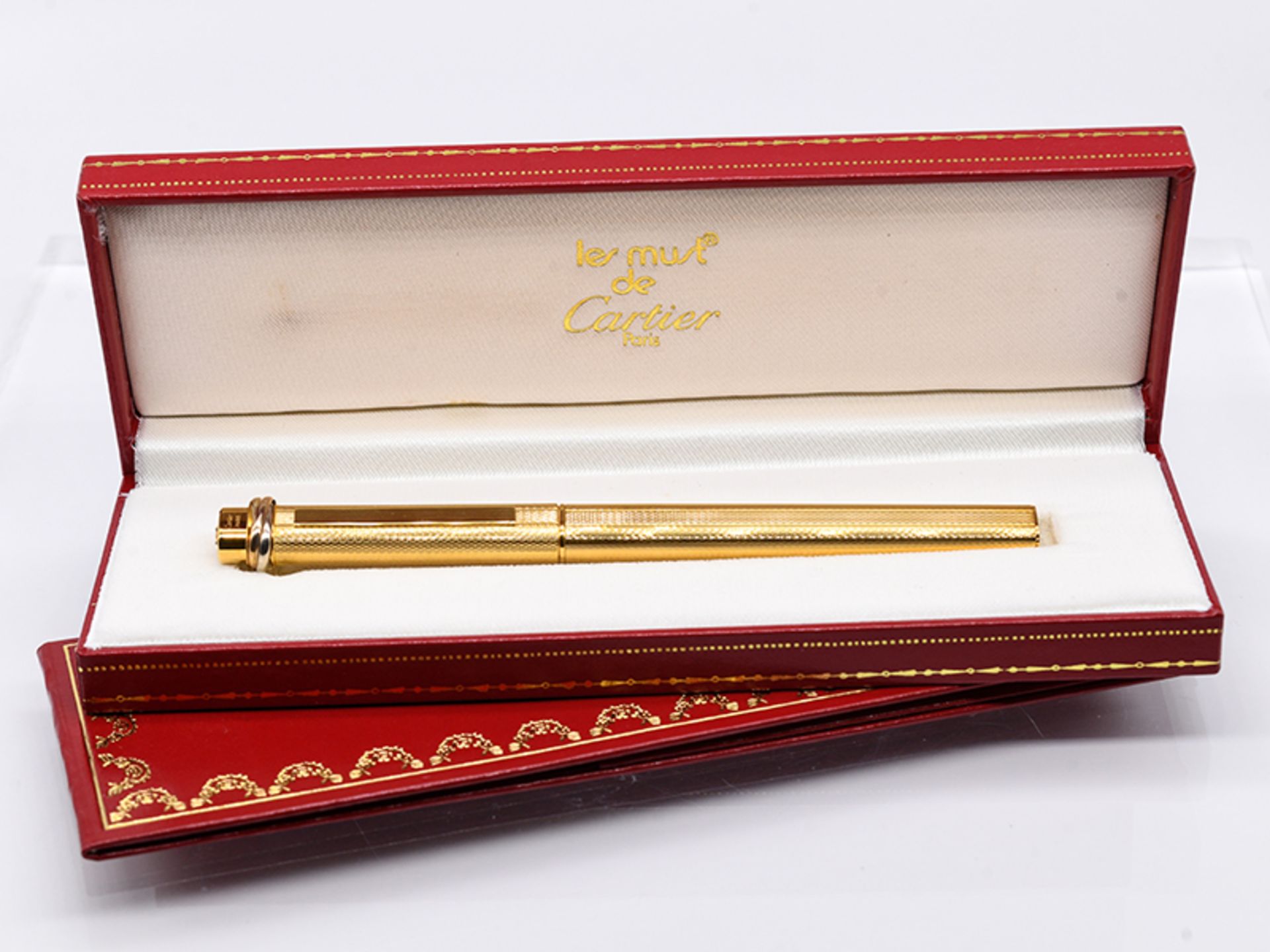 Cartier-Kugelschreiber "Vendome", Paris, 20. Jh. Vergoldet. Oval. Oben an der Hülle mit dem