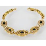 Gliederarmband mit 5 Saphiren und ca. 62 Brillanten, zus. ca. 1,3 ct, 80- er Jahre.