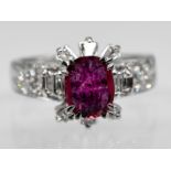 Ring mit Rubin ca. 0,80 ct und 22 Brillanten und Diamanten, zus. ca. 0,40 ct.70- er Jahre.