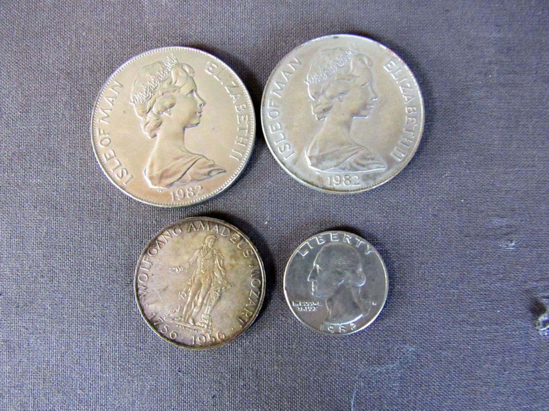 Vier Münzen ungeprüft 75,4