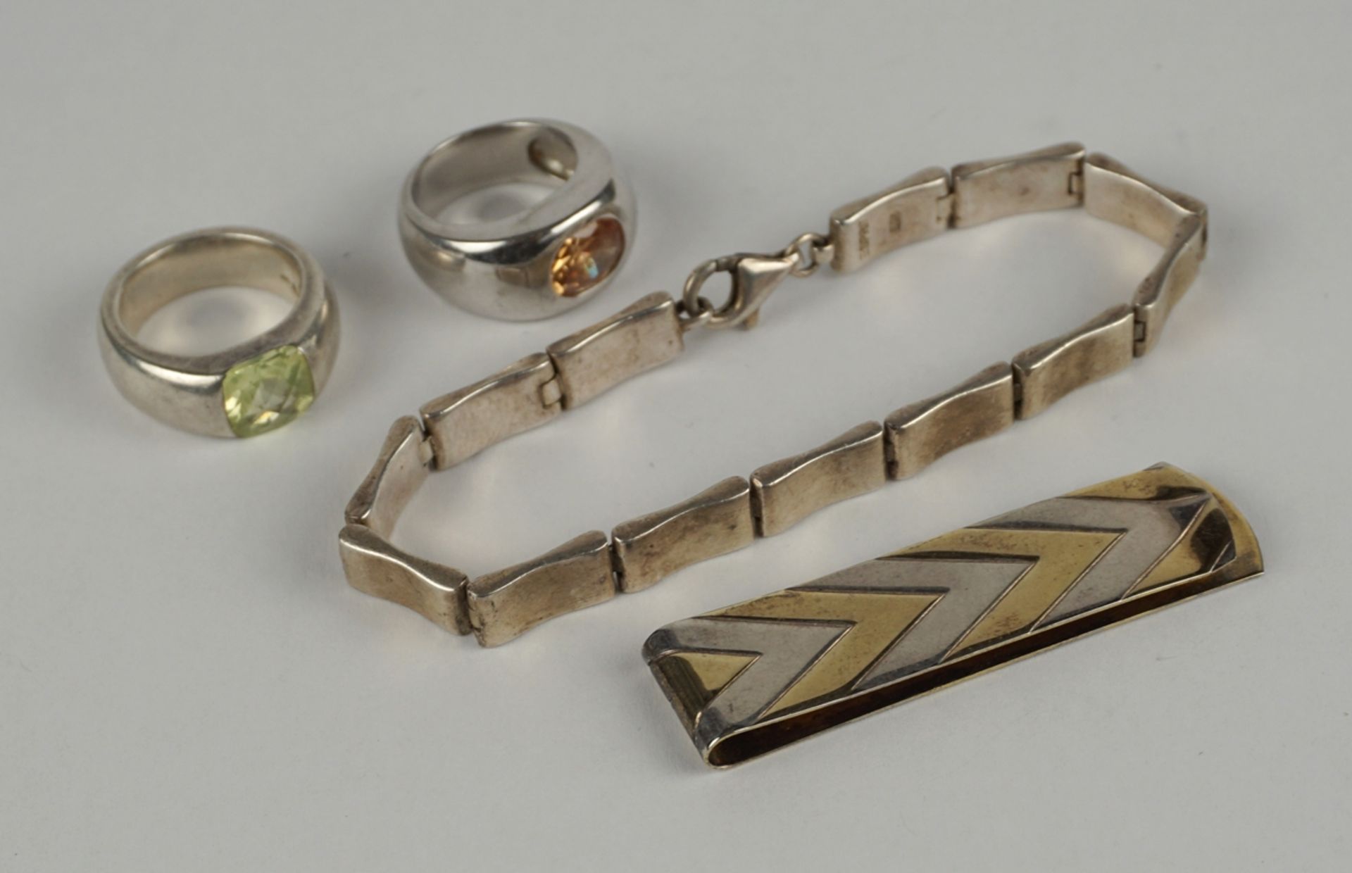 Armband, Geldklammer und 2 Ringe, 925er Silber, Gesamt-Gew.60,58g
