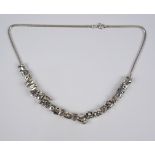 Schlangenkette mit 24 Charms, Silber, Gesamt-Gew.76,95g