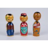 3 Kokeshi-Steckpuppen im Matrjoschka-Stil, Japan, Mitte 20. Jh.