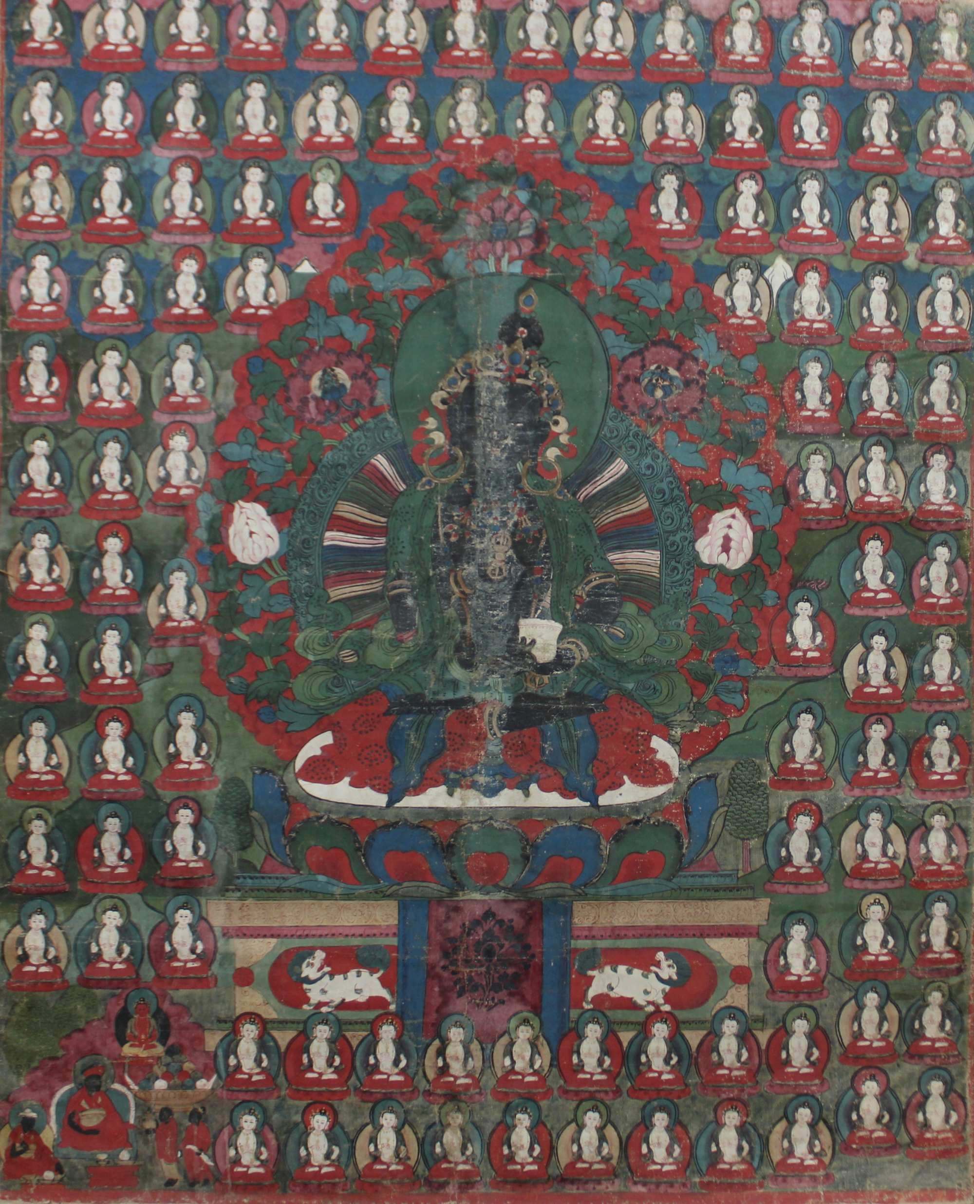 Thangka, 17./18. Jh., wohl Tibet, im zentrum Buddha auf eine Sockel mit zwei Löwen
