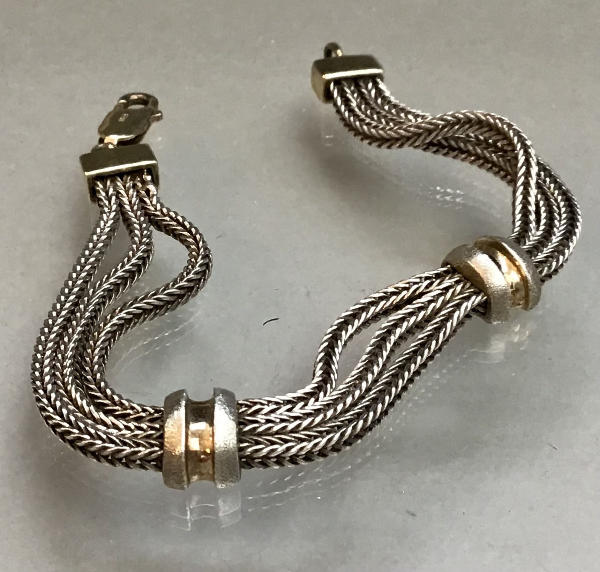 Armband, Silber punz. 925, drei Einzelketten - 2x mittig gefaßt, mit Karabinerverschluß, L 18cm