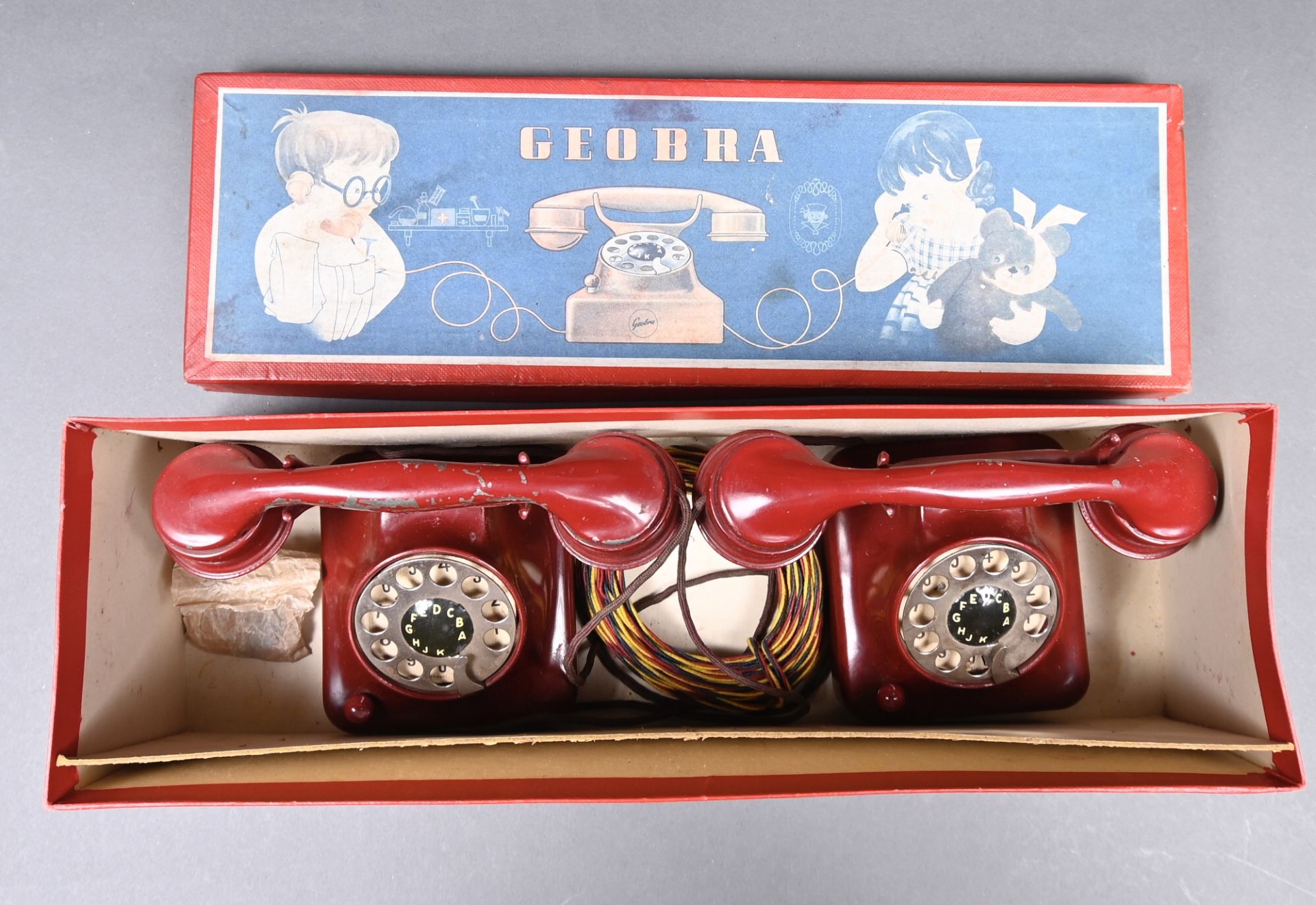 Kindertelefonanlage "Geobra" um 1950, im Originalkarton, bespielt aber gut erhalten
