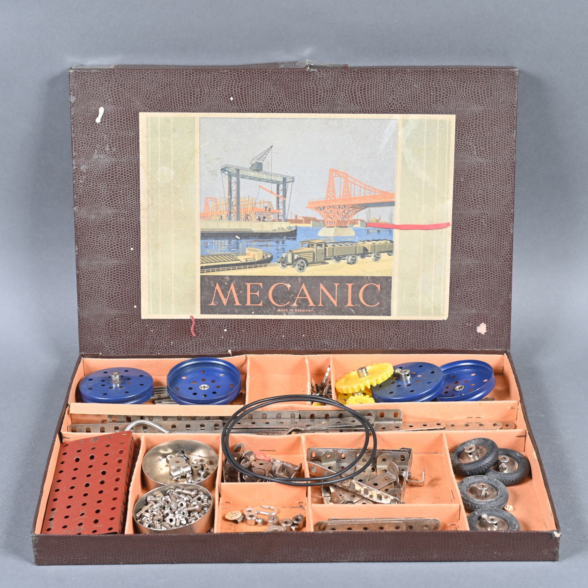 Metallbaukasten " Mecanic" der Fa. Dörken & Mankel KG., Voerde Westf., um 1950, mit Sammelmappe f.