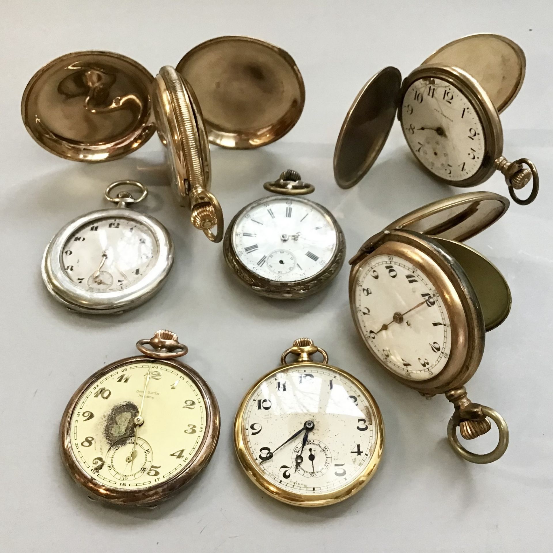 Konvolut Taschenuhren, 7 Stück, um 1900 bis 1920, für Bastler, dabei eine Sprungdeckeluhr