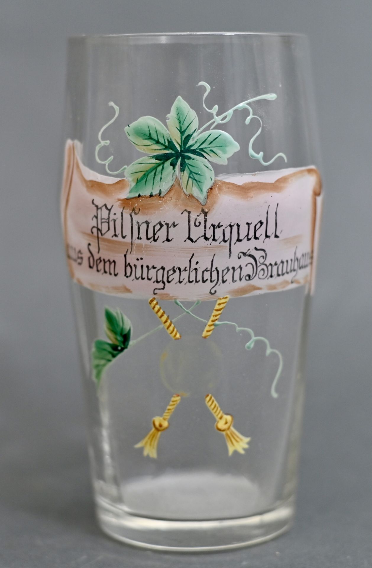 Becherglas "Pilsner Urquell aus dem bürgerlichen Brauhaus", H 15,5 cm, rücks. von Hand 0,5l geeicht,