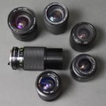 Sechs Fotoobjektive, Minolta Zoom 35-70mm, Canon Lens Japan 35 -80mm, Soligor 80-200mm,