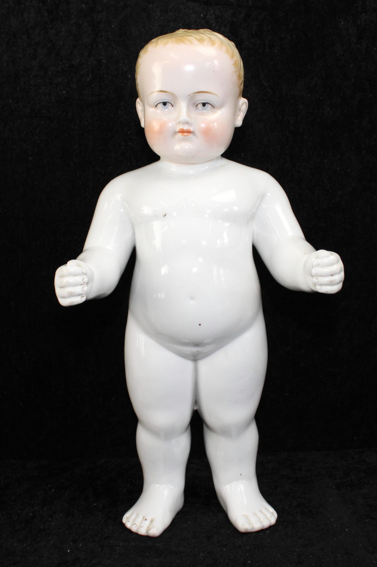 Große Porzellanfigur "Stehendes Baby", Kopf/Gesicht Unterglasurmalerei, 2.H.20.Jh., H: 34 cm