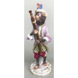 Meissen, Affe als Fagottist aus der "Affenkapelle", Schwertermarke Meißen, 1. Wahl, H. 15,5 cm.