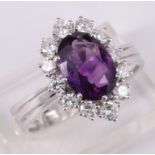 Damenring, 585er WG, mit sehr schönem, lilafarbenem Amethyst, 3,4 ct, sowie 12 Brillanten, insg. 0,