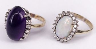 2 Ringe, 750er WG (geprüft), mit Amethyst und Opal (best.) sowie insg. 28 Diamanten, RG56 und