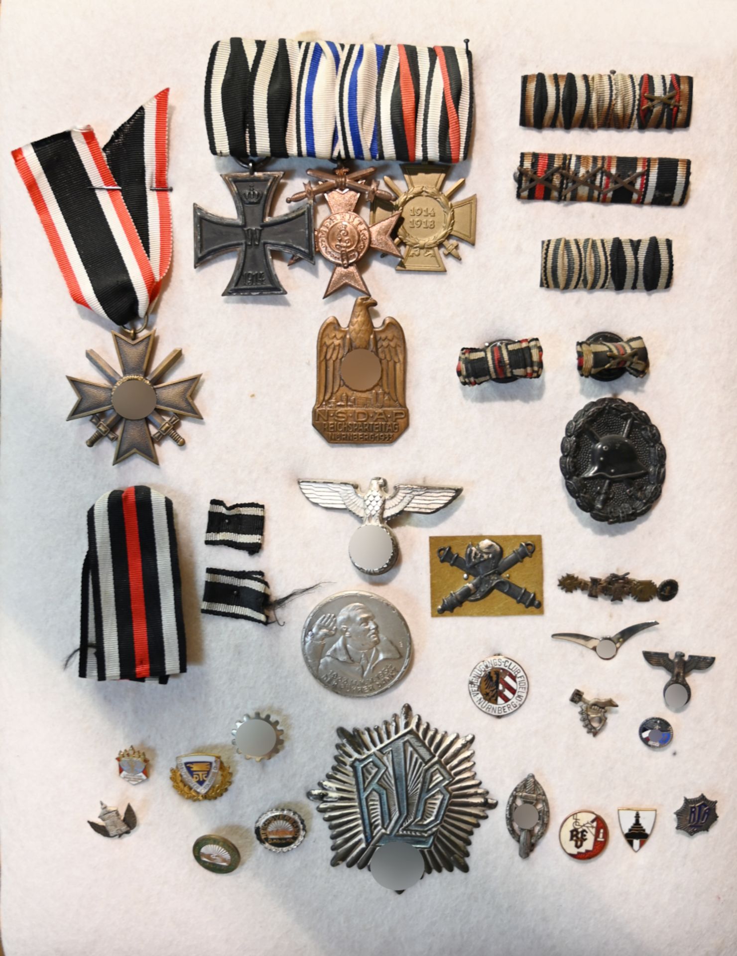 1 Konv. Orden z.T. 3. Reich "Kriegsverdienstkreuz" mit Schwertern, "Ehrenkreuz für Frontkämpfer", "E