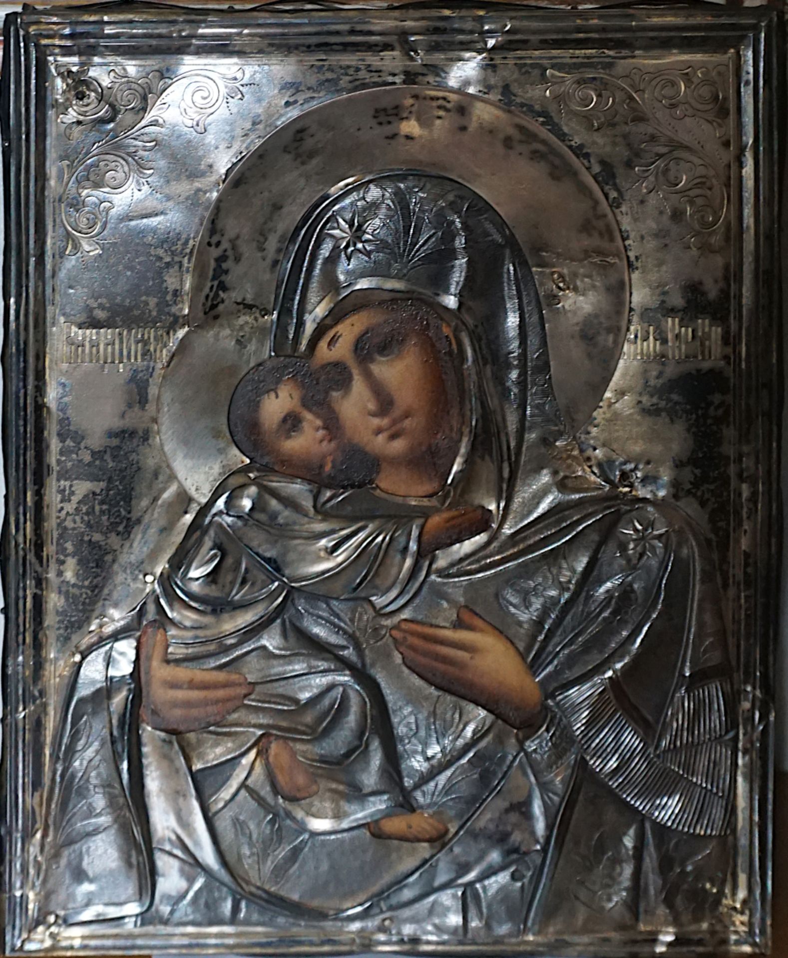 1 Ikone "Maria mit Kind" m. silberfarbenem Oklad