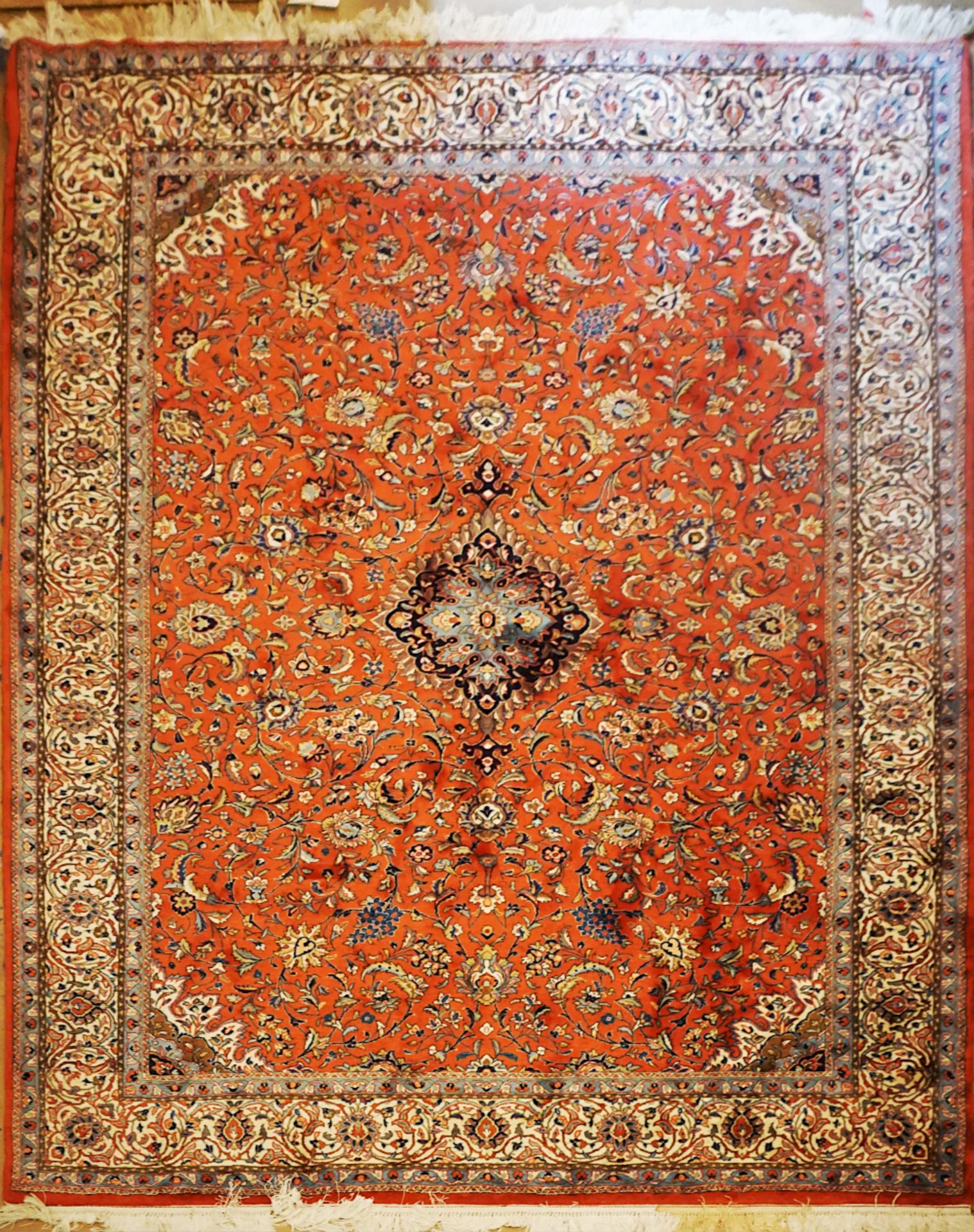 1 Orientteppich GHASWIN, Persien rotgrundig/flor. Dekor ca. 294x203cm, min. ber., Asp.