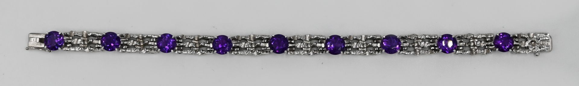 1 Damenarmband WG 14ct. wohl Amethyste Gesamtlänge ca. 17,5cm