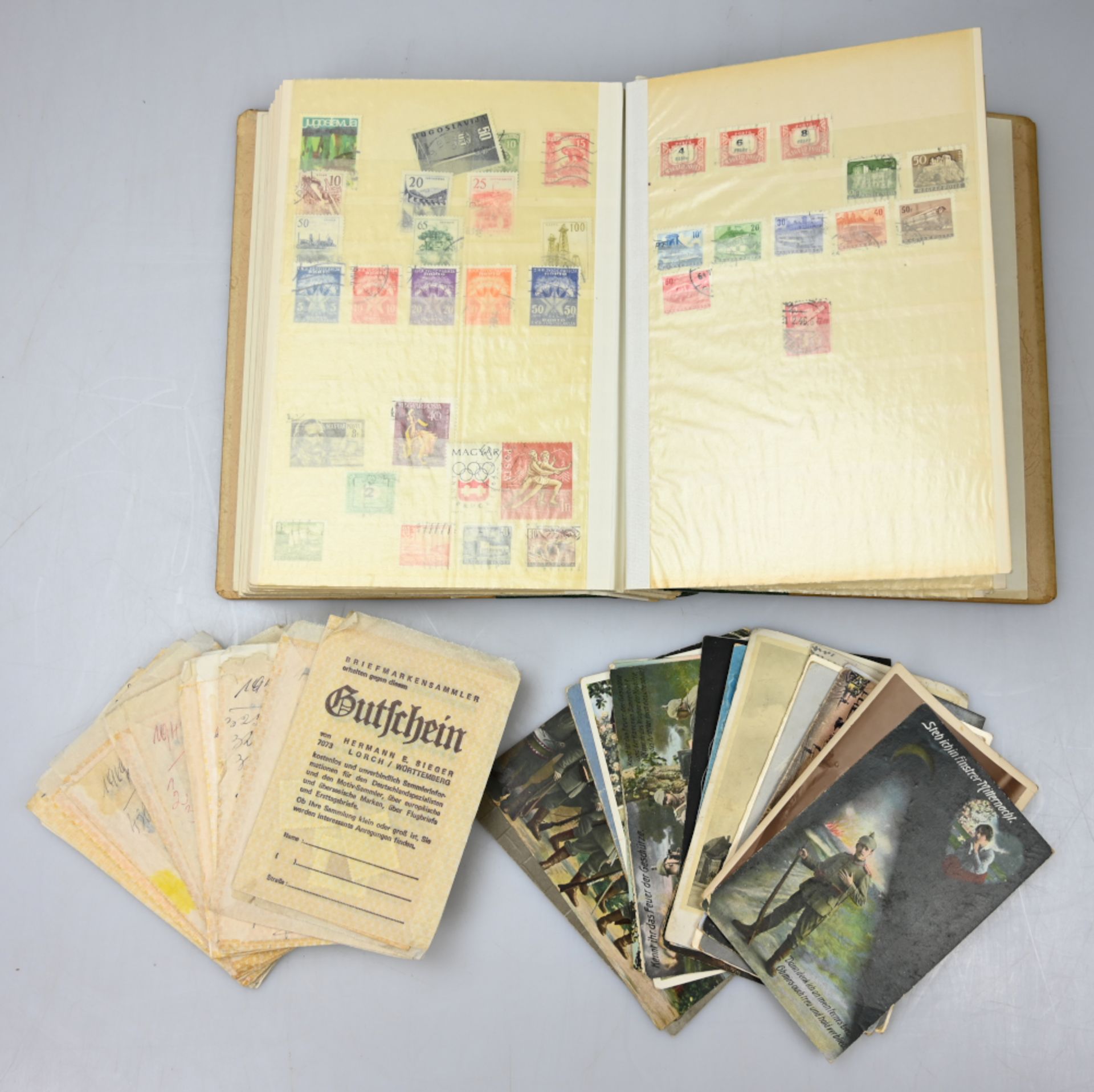 1 Konv. Postkarten (über 50 Stück) z.T. 1. WK z.T. gelaufen/frankiert, 2 Broschüren "Liederbuch der