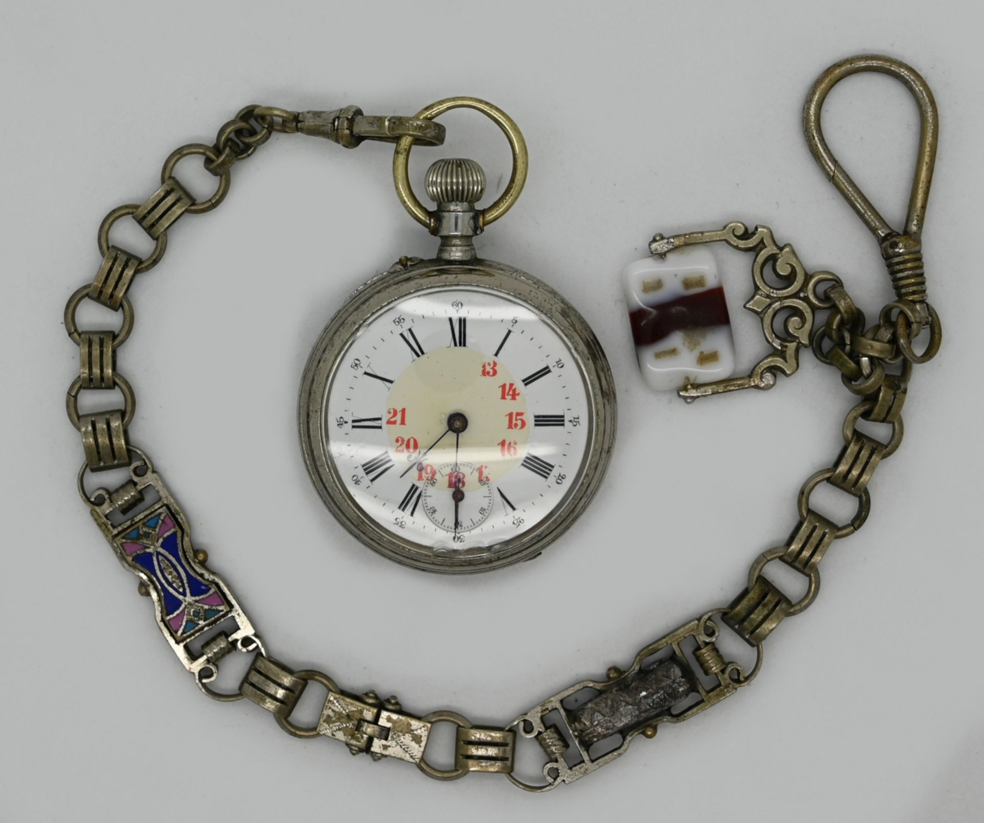 1 Taschenuhr um 1900, Metall mit Kette, Glas besch., Asp./ Gsp.