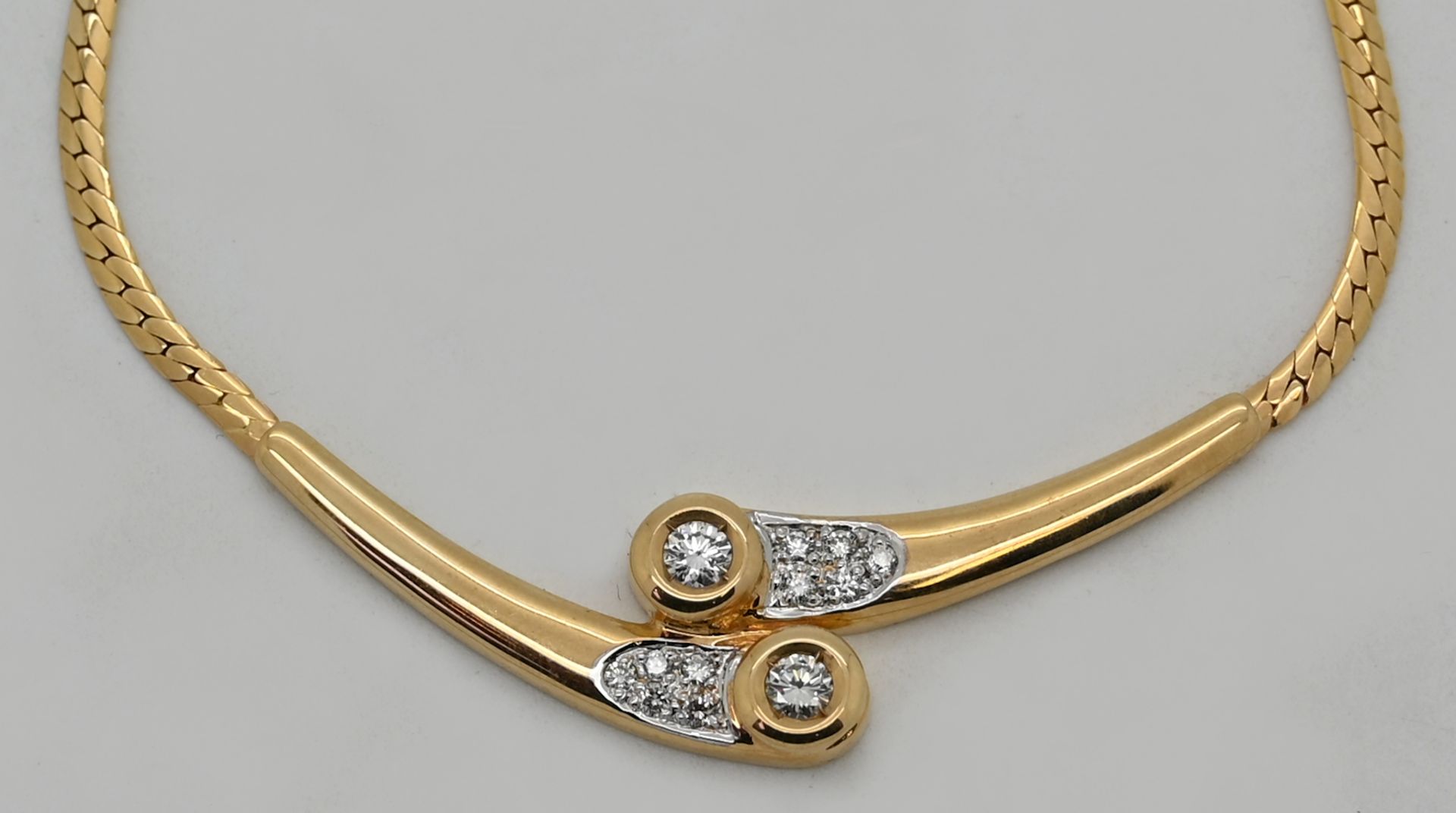 1 Collier GG 14ct. mit Brillanten (2x ca. 0,15ct.) min. Tsp.