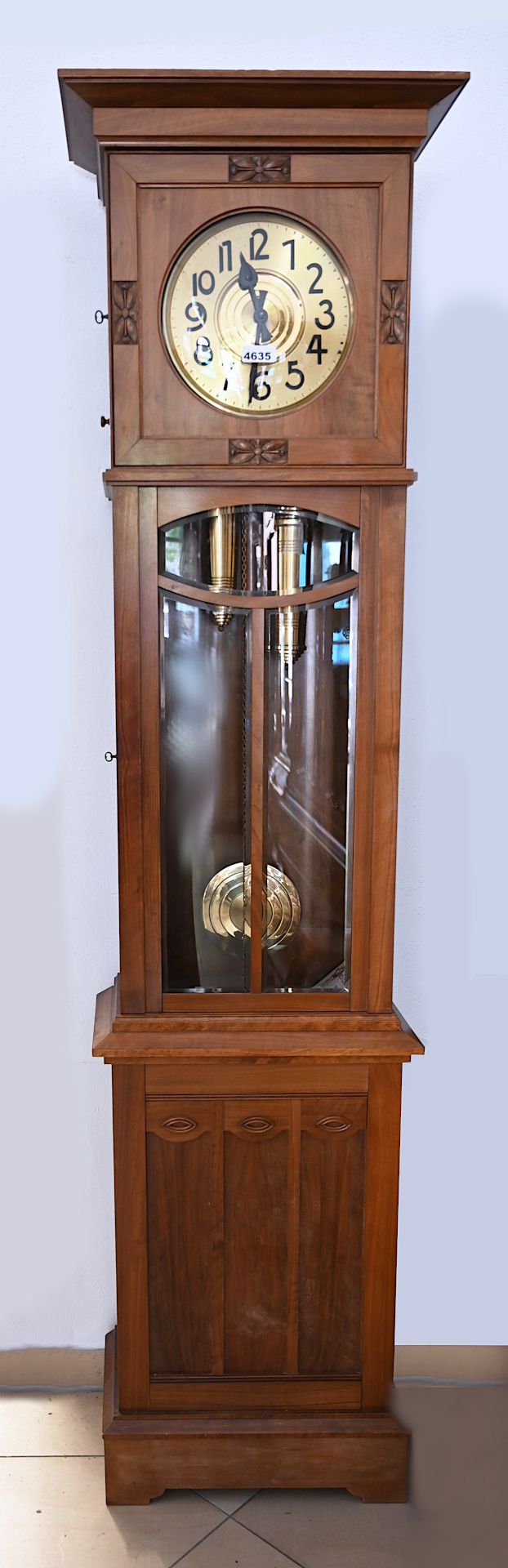 1 Standuhr wohl Anfang 20. Jh. Holzgehäuse, Messingziffernblatt,