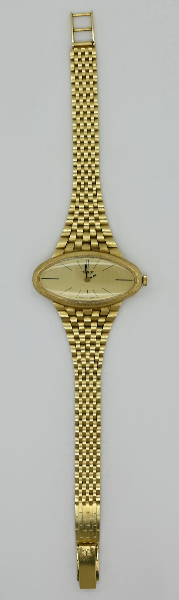 1 Damenarmbanduhr TISSOT GG 14ct. Handaufzug (Uhr läuft an) Tsp.