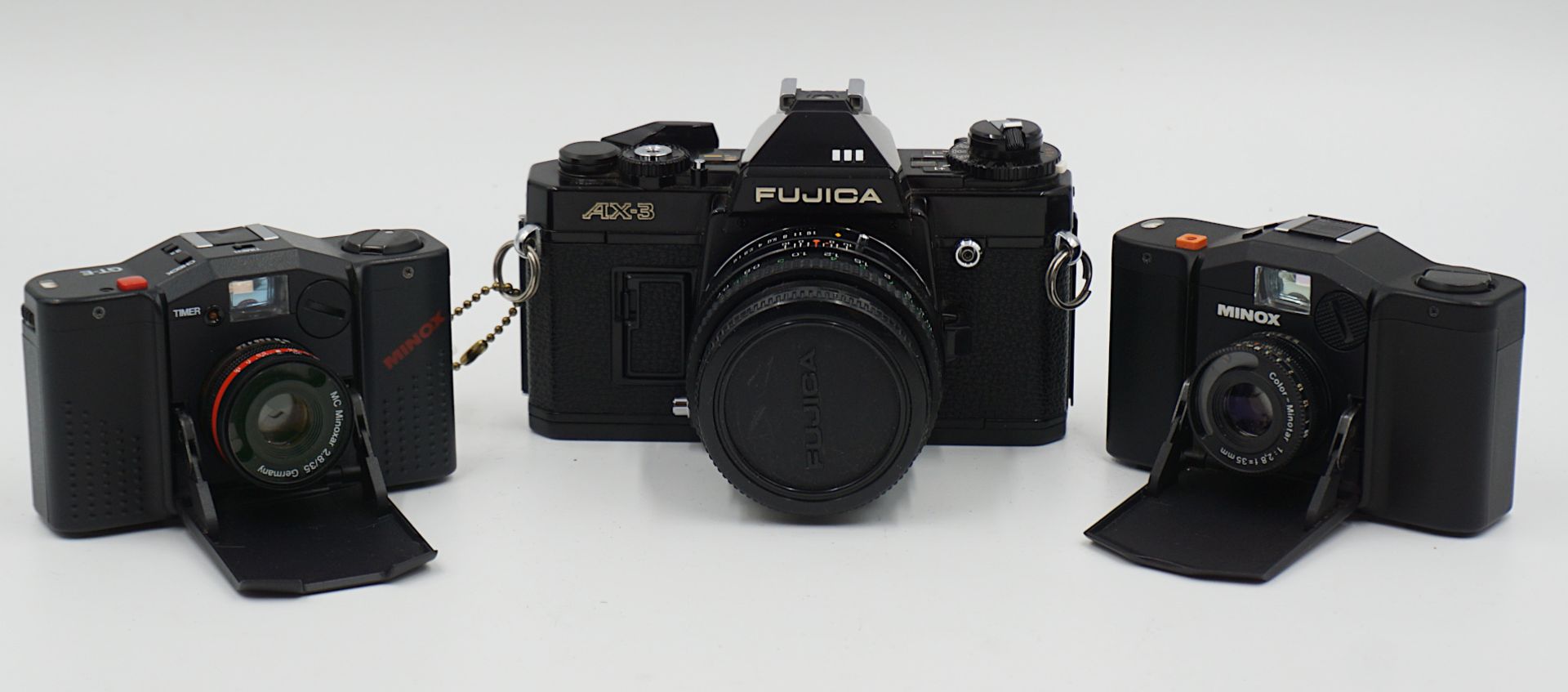 3 Fotoapparate: FUJICA "AX-3", MINOX "35GL"/"GT-E", Objektive TOKINA "80-200mm 1:4", MORRIS "1A",