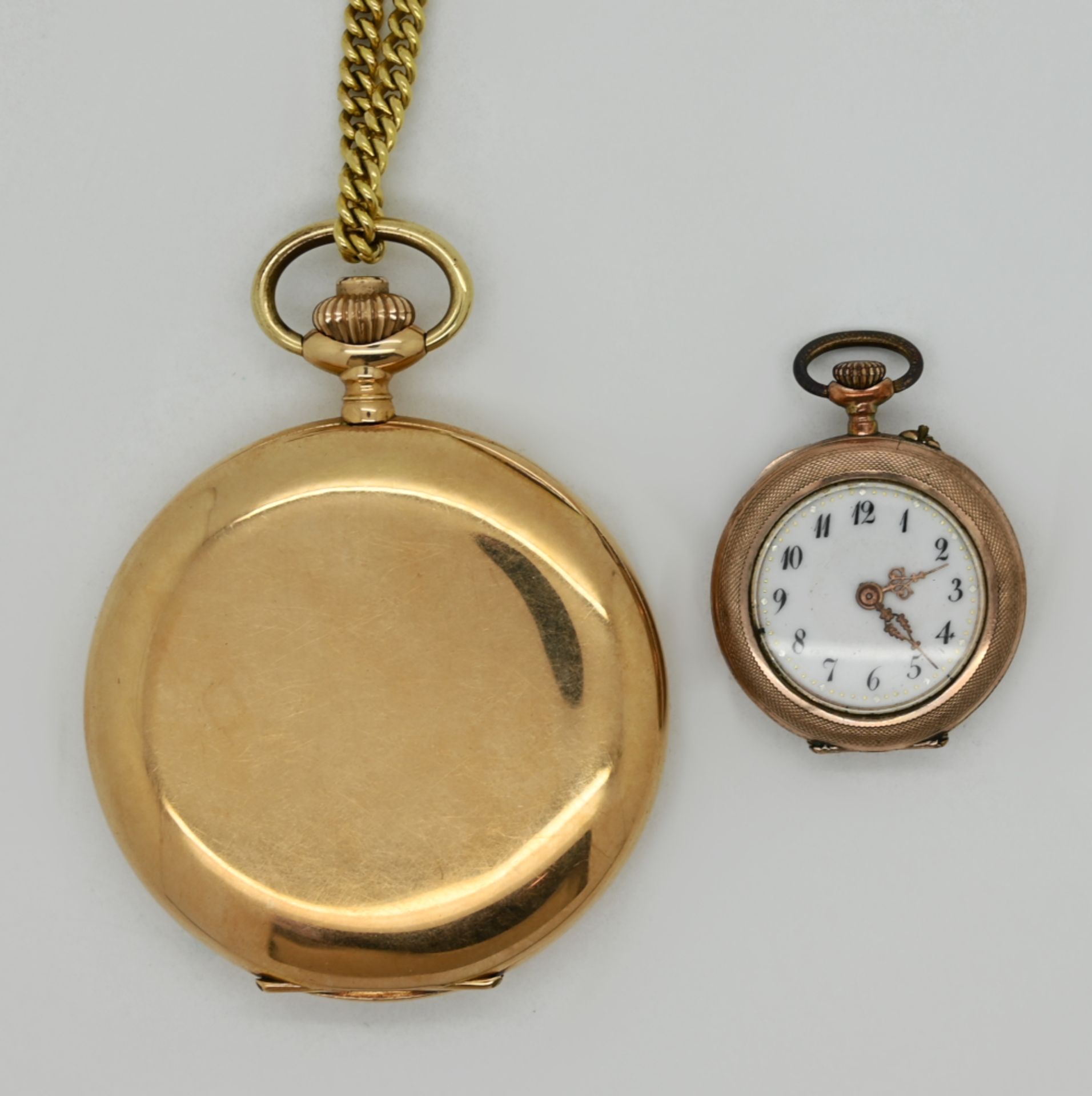 1 Herrentaschenuhr GG 14ct., Kette vergoldet sowie 1 Damentaschenuhr wohl RG um 1900 jew. Asp./ Gsp. - Bild 2 aus 2