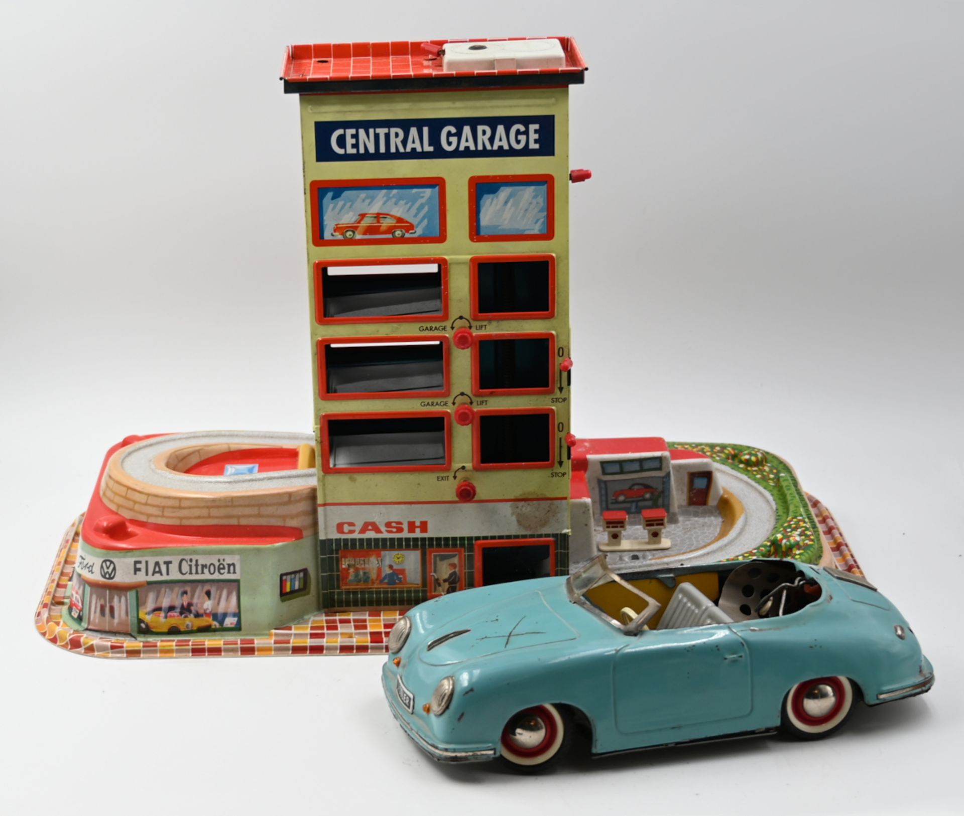 1 Konv.: 1 Autospiel TECHNOFIX "Central Garage" wohl 1960er Jahre, 1 Porsche DISTLER "Electromatic 7