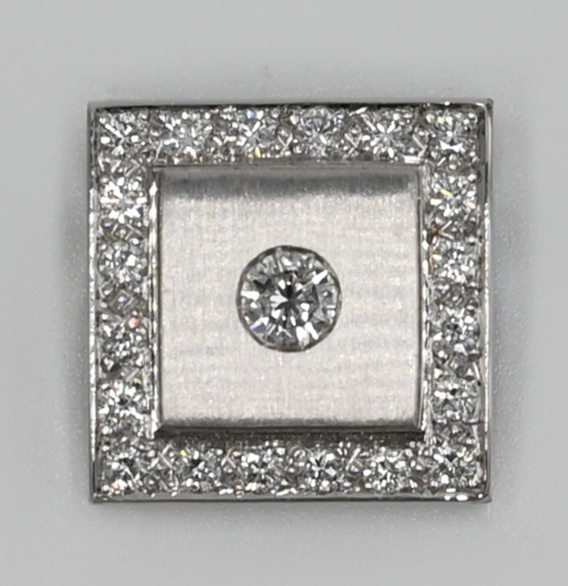 1 Anhänger (ideal für Reif) WG 18ct., zentral Brillant ca. 0,15ct. &