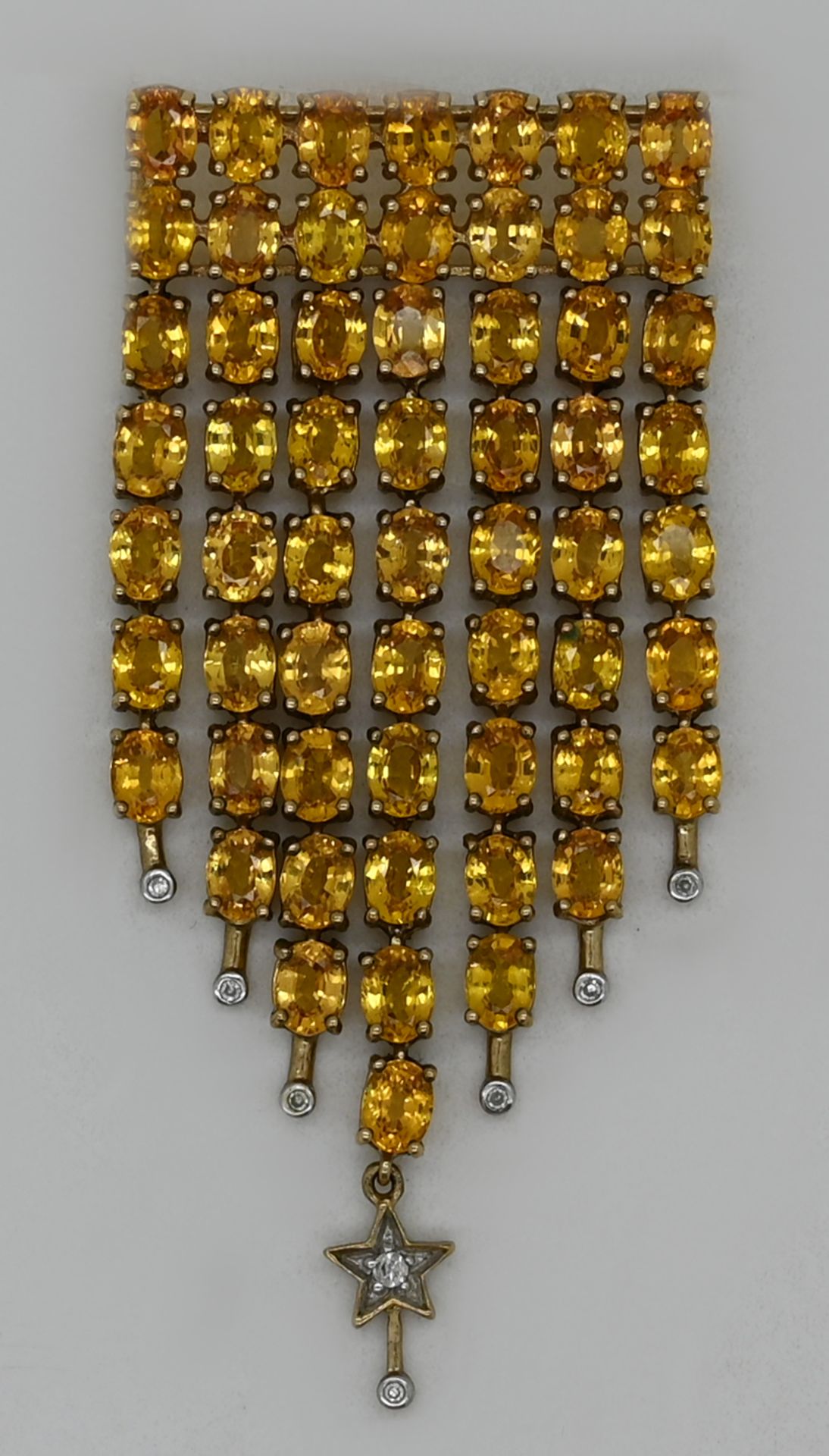 1 Anhänger ungestempelt, wohl GG 14ct., wohl Citrine, Diamanten, Gesamtlänge ca. 6cm, Tsp.