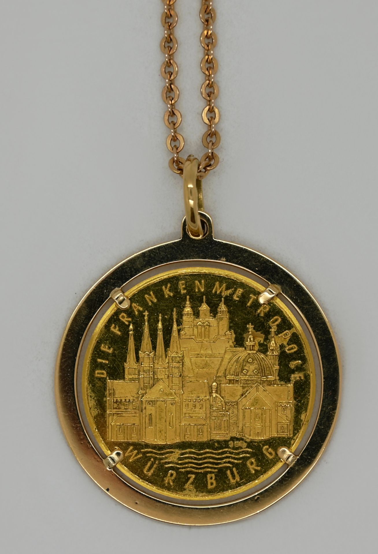 1 Kette GG 14ct., 1 Goldmünzanhänger GG 18ct. "Würzburg", Tsp.