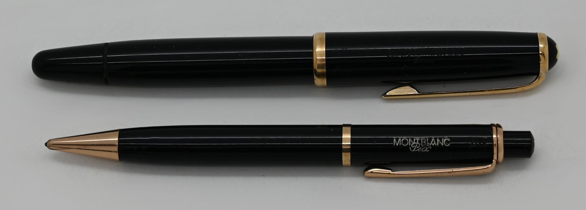 1 Füller, Feder GG 14ct., 1 Schreibgerät, jeweils MONTBLANC, jeweils Gsp. in 1 Originaletui, jeweils