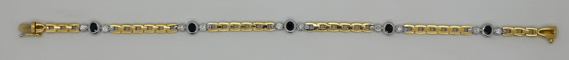 1 Damenarmband ungestempelt, wohl GG 14ct. mit Saphiren und Brillanten, Gesamtlänge ca. 20,5cm, min.