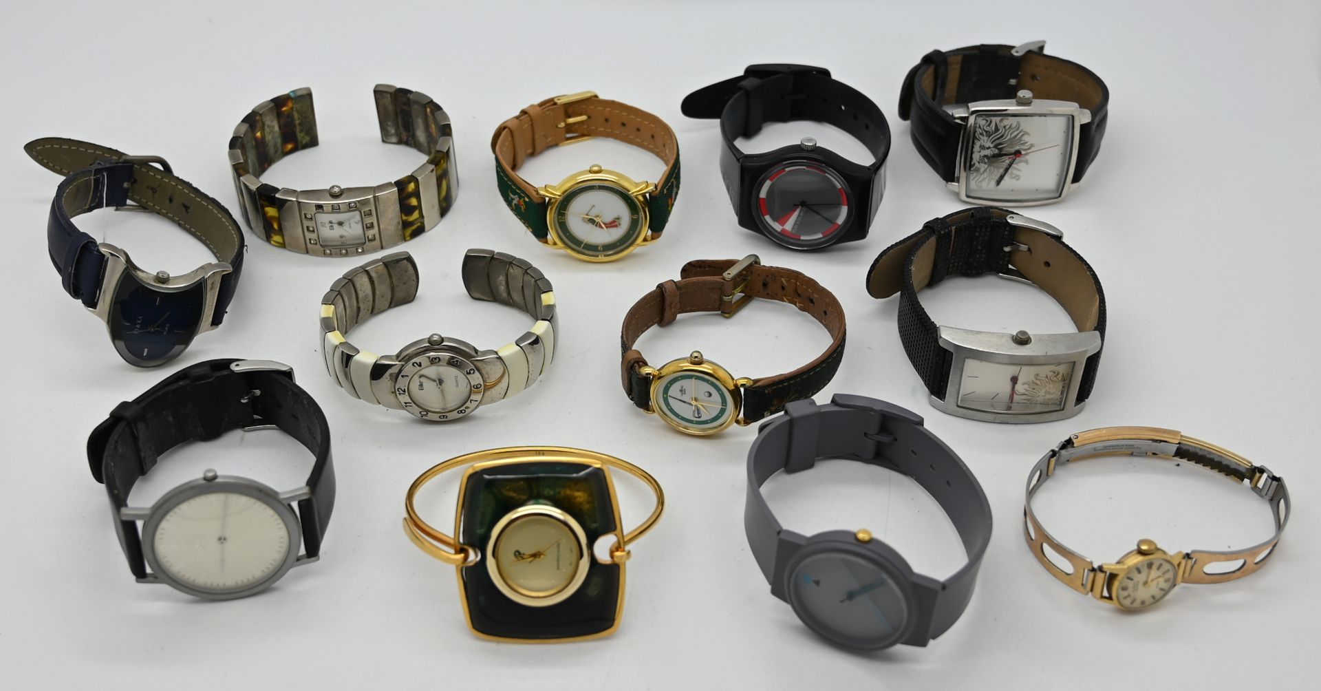 1 Uhrengehäuse ANKER GG 14ct., sowie verschiedene Armbanduhren: Metall, Kunststoff, Leder u.a. jew.