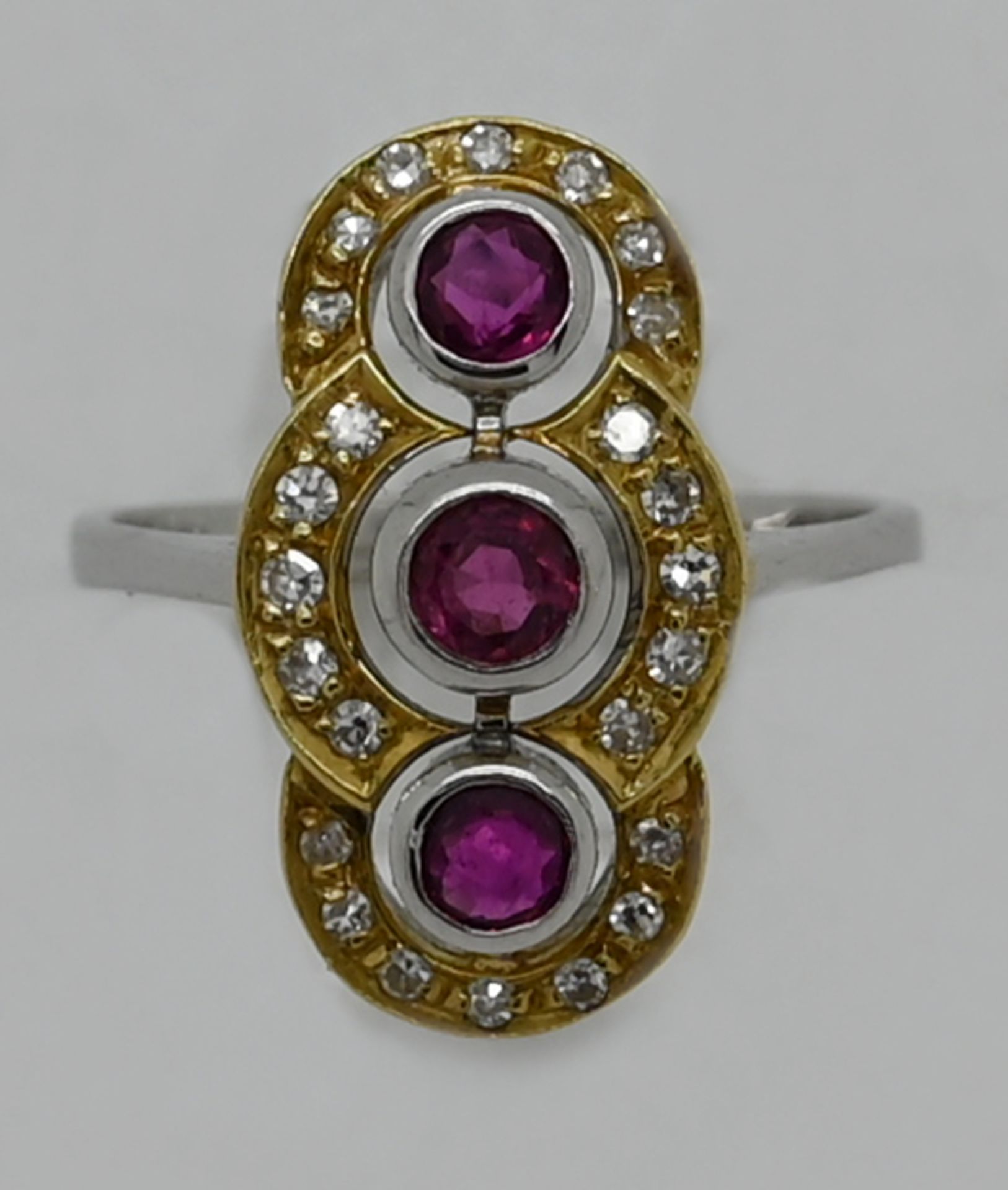 1 Damenring GG/ WG 14ct. mit Brillanten, wohl Rubine bis zu ca. 0,2ct., Ringgröße ca. 55,5