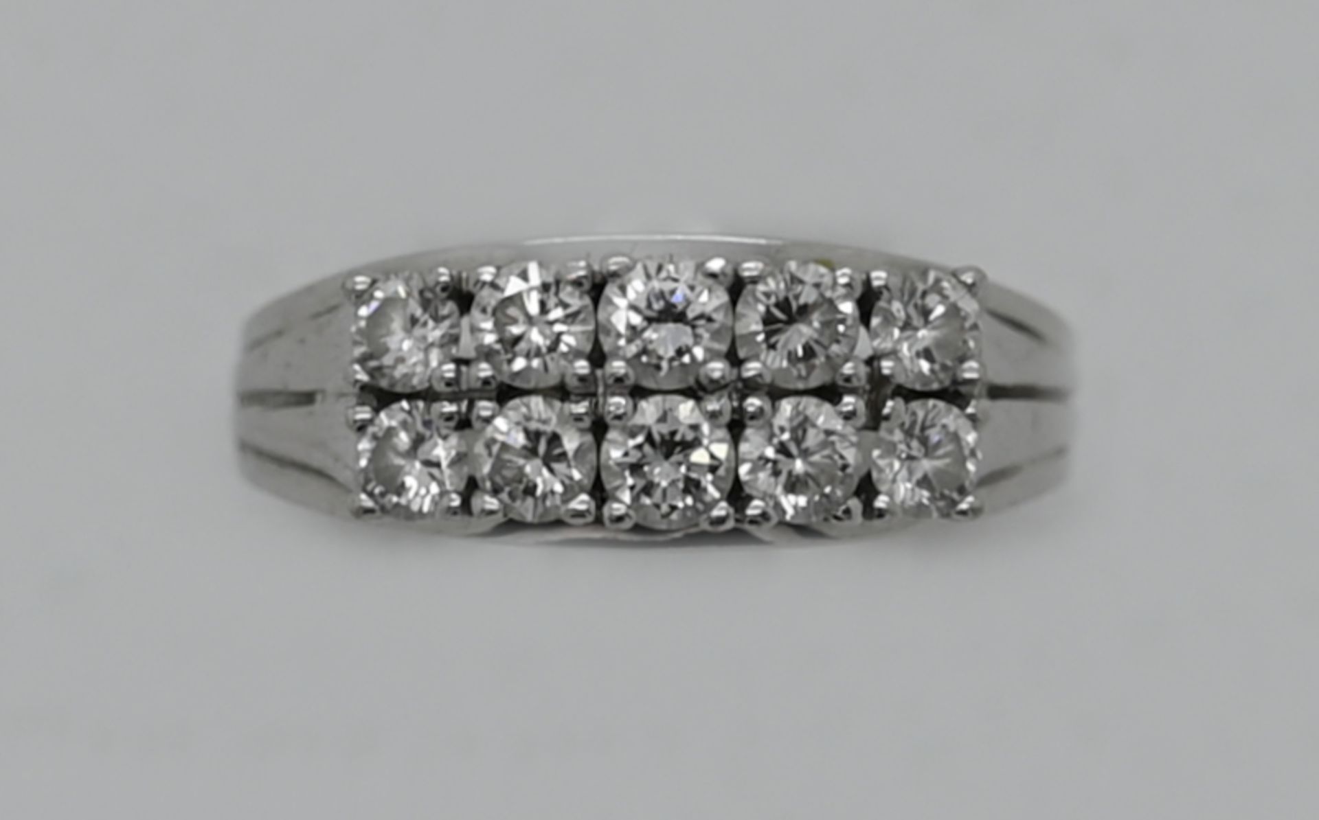 1 Damenring WG 14ct. mit 10 Brillanten bis zu ca. 0,12ct., Ringgröße ca. 56, Tsp.