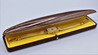 Damen Armbanduhr vergoldet, Marke Glashütte DDR 50/60er Jahre, rechteckiges Gehäuse und Armband mas