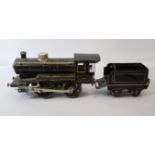 Märklin Dampflok (Uhrwerk) mit Tender Spur 0, Eisenkern schwarz handbemalt mit roten Linien abgeset