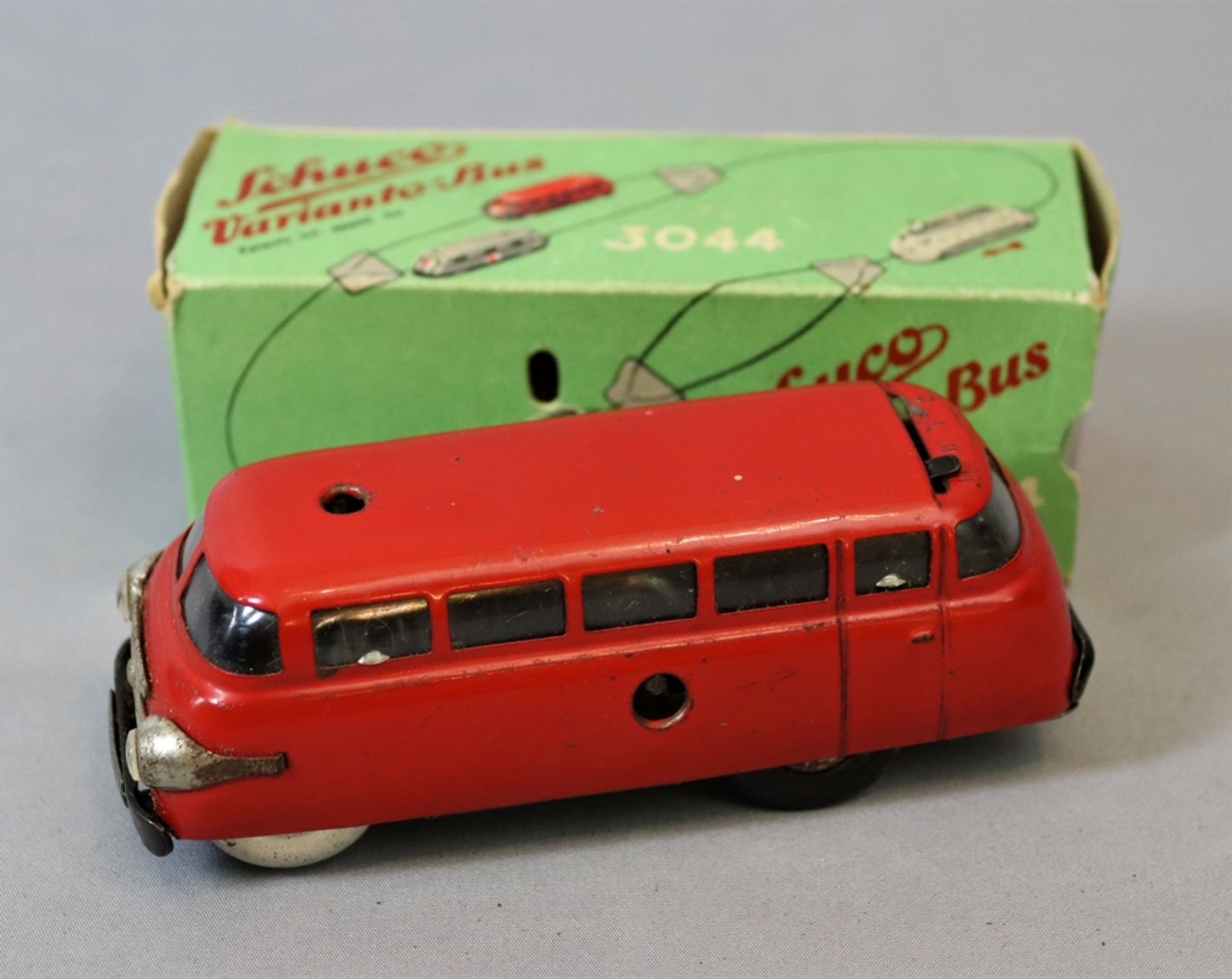 Schuco Varianto-Bus 3044, nach 1945, Made in USA-Zone Germany mit Fernlenker, Antrieb Uhrwerk, Eise