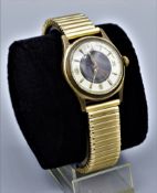 Herren Armbanduhr der 60er Jahren Marke Pendic, umlaufendes dehnbares Gliederarmband, Uhr mit runde
