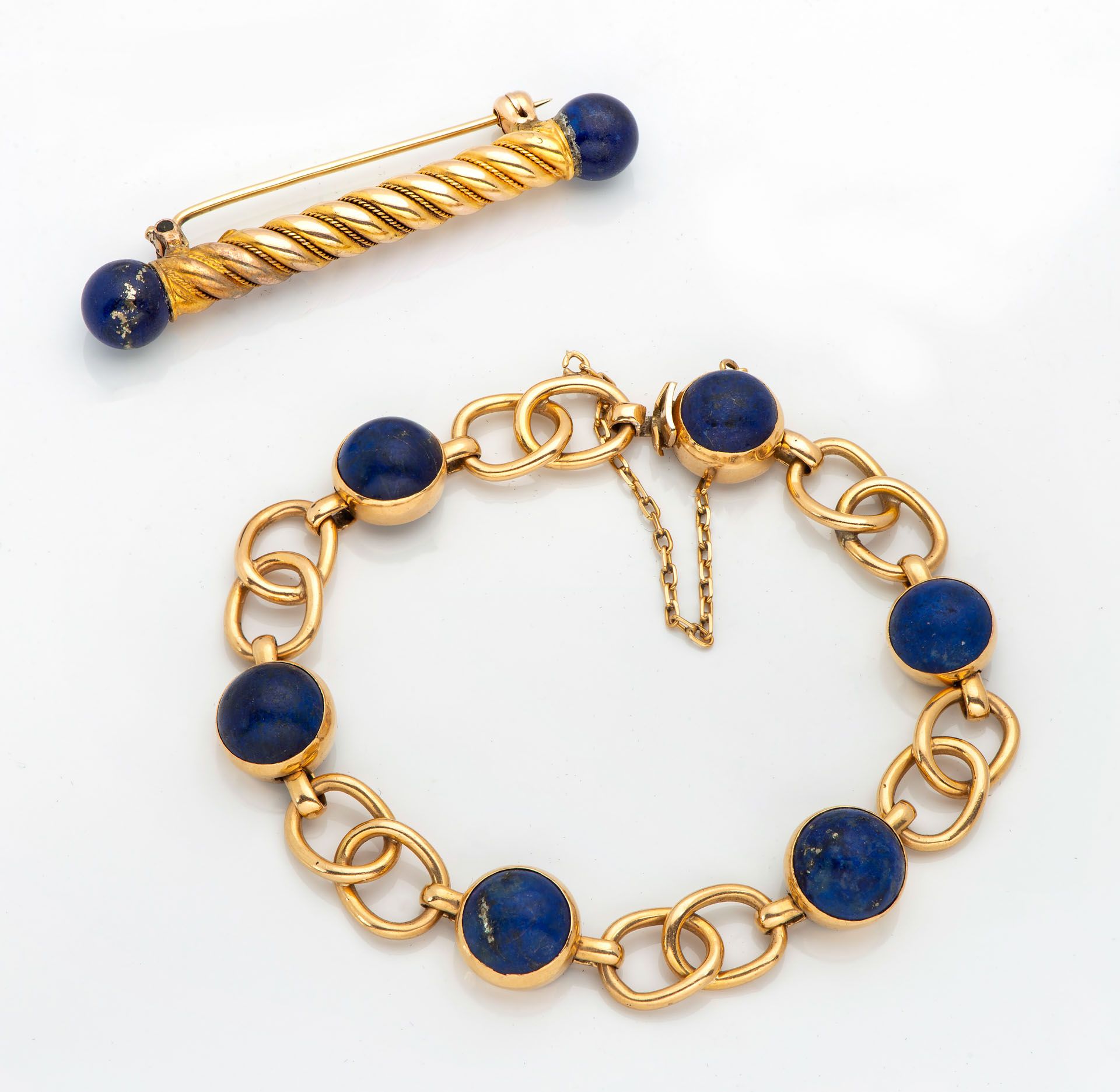 A Set of 18K Gold and Lapis Lazuli Bracelet and Brooch