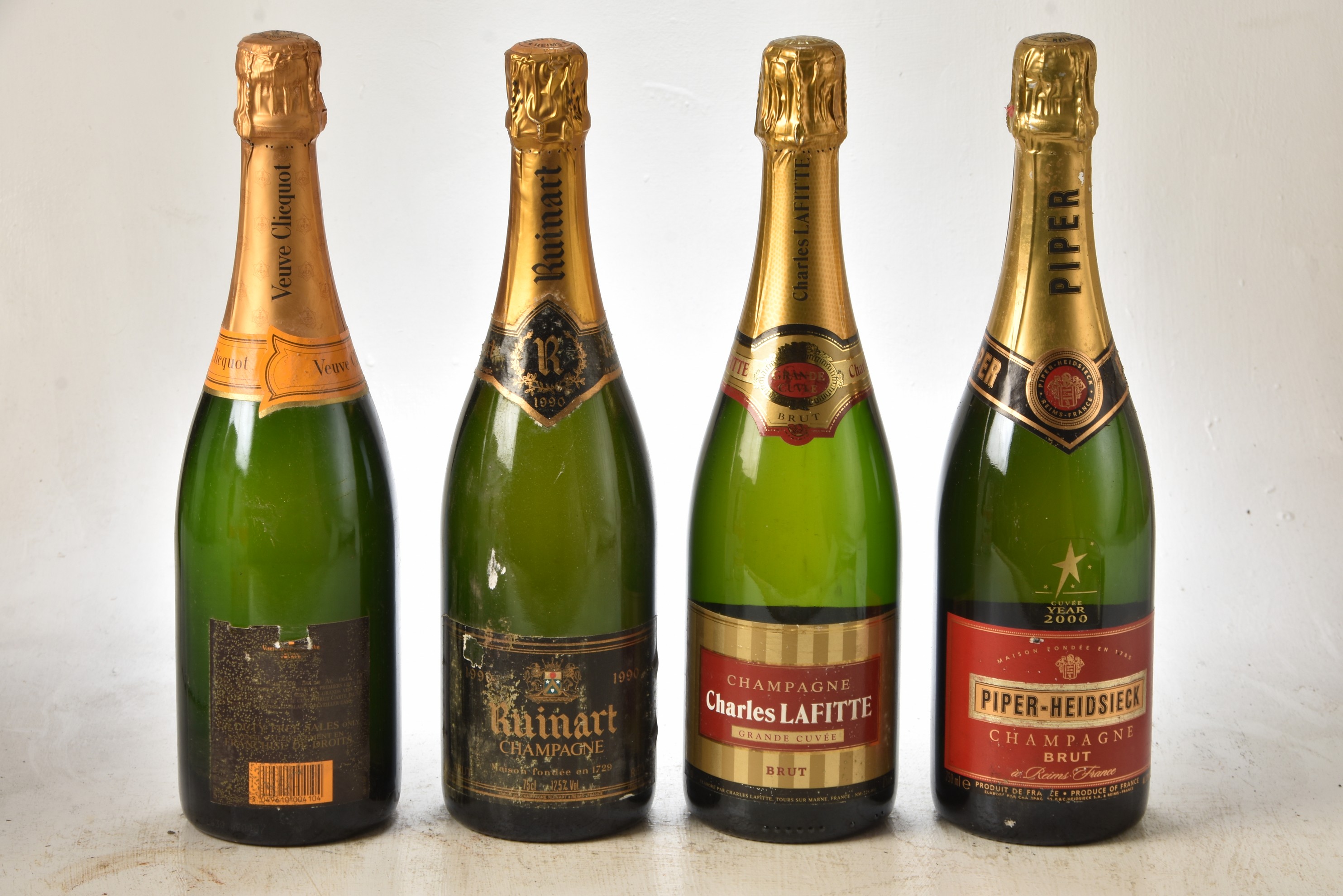 Champagne Ruinart Brut Vintage 1990 1 bt Champagne Veuve Cliquot Brut NV 1 bt Champagne Charles Lafi