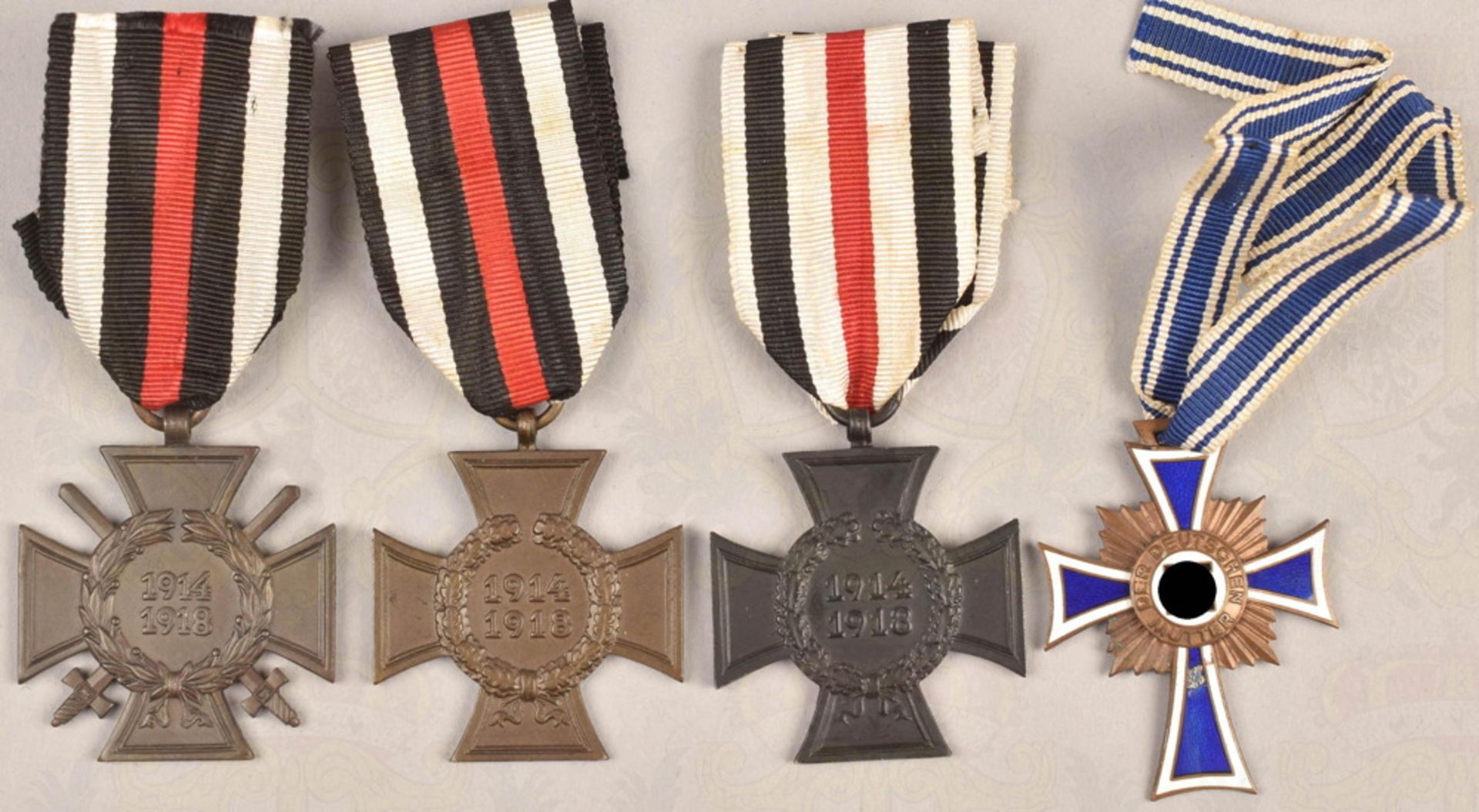 3 Ehrenkreuze 1914/18 und Mutterkreuz in Bronze