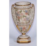 A Granger & Co Worcester two handled trophy shaped reticulated vase, painted and gilt with broad