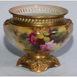 A Royal Worcester pot pourri vase, painted with pink and red cabbage roses, applied gilt scrolls,