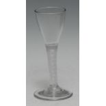 A George III opaque twist wine glass, conical bowl, double-helix stem, domed circular foot, 14.5cm