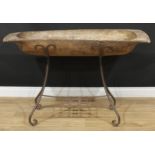 A European wooden trencher style dough bowl or trough, metal stand, 83cm high overall, the trough