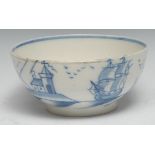 An English bowl, probably Liverpool, painted with ships and buildings in underglaze blue, 19.5cm